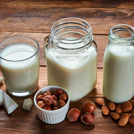 3 bottles of milk - coconut almond hazelnut